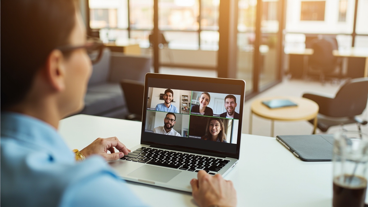 Teacher with group of adults in online class